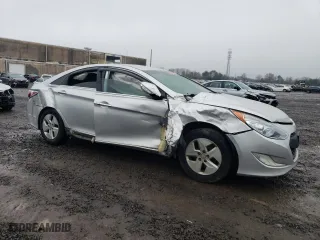 2012 Hyundai Sonata Hybrid with VIN KMHEC4A47CA039099, listed as a Copart auction lot 84867944 with 190,253 mi miles and Salvage Title. Bid and sale history available at carsss.com. Image 4.