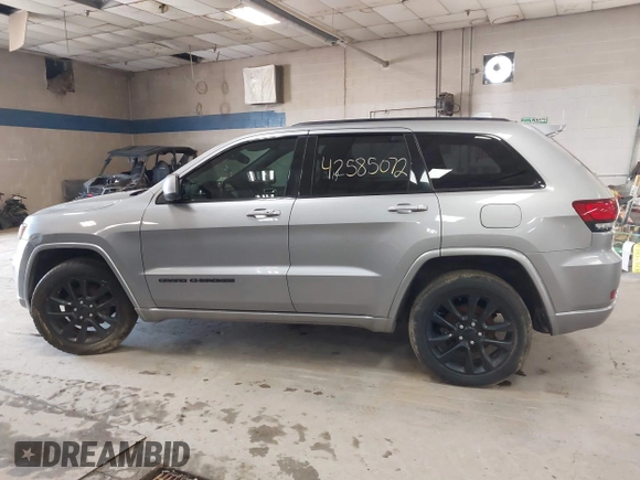 2018 Jeep Grand Cherokee Laredo E with VIN 1C4RJFAG7JC203793, listed as a IAAI auction lot 42585072 with 263,987 mi miles and . Bid and sale history available at DreamBid. Image 14.