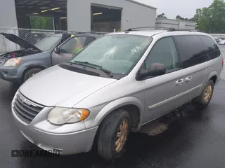 2007 Chrysler Town & Country Touring with VIN 2A4GP54L57R134721, listed as a IAAI auction lot 42242154 with 191,917 mi miles and . Bid and sale history available at DreamBid. Image 2.