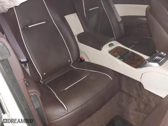 2014 Rolls-Royce Wraith with VIN SCA665C59EUX84389, listed as a IAAI auction lot 41413368 with 57,951 mi miles. Bid and sale history available at carsss.com. Image 8.