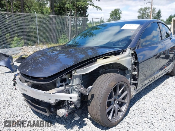 2023 Tesla Model 3 z VIN 5YJ3E1EA6PF650212, wystawiony jako IAAI lot #42554747 z przebiegiem 49 838 mil mil oraz . Historia ofert i sprzedaży dostępna na DreamBid. Obrazek 6.