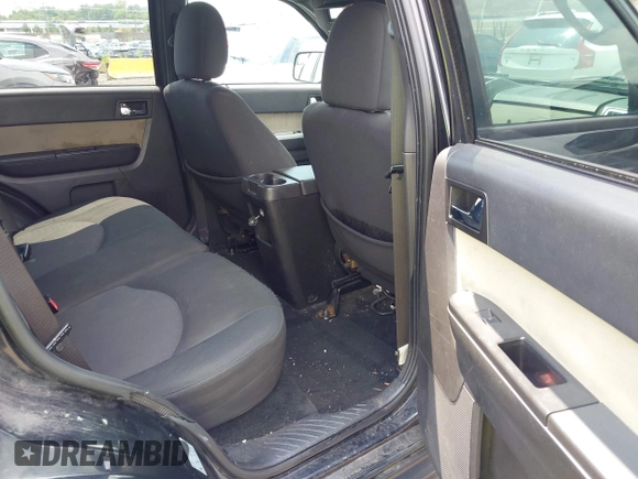 2011 Mercury Mariner with VIN 4M2CN8B78BKJ03515, listed as a IAAI auction lot 42751308 with 248,356 mi miles and . Bid and sale history available at DreamBid. Image 8.