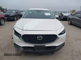 2022 Mazda CX-30 S with VIN 3MVDMBALXNM422418, listed as a IAAI auction lot 41531552 with 21,909 mi miles and . Bid and sale history available at carsss.com. Image 12.