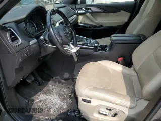 2019 Mazda CX-9 Grand Touring z VIN JM3TCADY9K0300284, wystawiony jako Copart lot #51801365 z przebiegiem 53 550 mil mil oraz Szkoda całkowita • Salvage title. Historia ofert i sprzedaży dostępna na DreamBid. Obrazek 7.