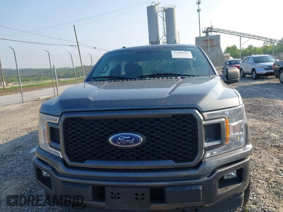 2018 Ford F-150 XL with VIN 1FTEW1EP9JFB24945, listed as a IAAI auction lot 42380592 with 132,895 mi miles and . Bid and sale history available at DreamBid. Image 13.