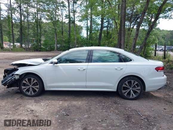 2021 Volkswagen Passat SE with VIN 1VWSA7A38MC014396, listed as a IAAI auction lot 42201818 with 62,193 mi miles and . Bid and sale history available at DreamBid. Image 15.