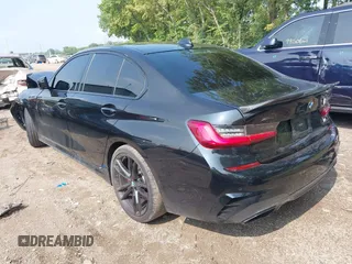 2021 BMW 3 Series M340i xDrive with VIN 3MW5U9J0XM8B53474, listed as a IAAI auction lot 39952984 with 55,938 mi miles. Bid and sale history available at carsss.com. Image 3.