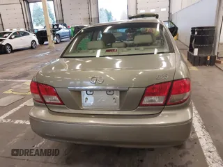 2003 Infiniti I35 Luxury with VIN JNKDA31A53T117792, listed as a IAAI auction lot 41210068 with 94,684 mi miles. Bid and sale history available at carsss.com. Image 16.
