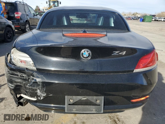 2013 BMW Z4 sDrive28i with VIN WBALL5C50DJ103778, listed as a Copart auction lot 49452215 with 104,203 mi miles and Salvage Title. Bid and sale history available at carsss.com. Image 6.
