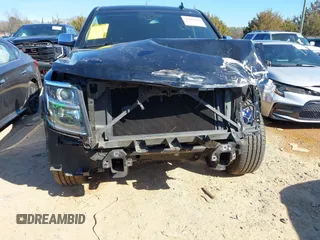 2020 Chevrolet Tahoe LTZ with VIN 1GNSCCKCXLR106732, listed as a IAAI auction lot 41486660 with Not provided miles and . Bid and sale history available at DreamBid. Image 6.