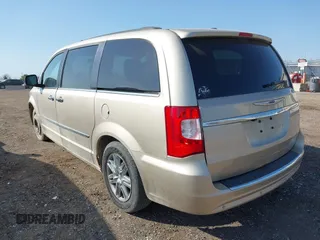 2012 Chrysler Town & Country Touring-L with VIN 2C4RC1CG0CR340692, listed as a IAAI auction lot 42112578 with 200,681 mi miles. Bid and sale history available at carsss.com. Image 3.