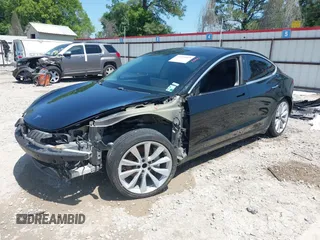 2018 Tesla Model 3 Long Range Battery with VIN 5YJ3E1EAXJF019907, listed as a IAAI auction lot 41995969 with Not Provided miles and . Bid and sale history available at DreamBid. Image 20.