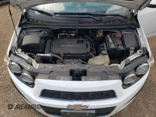 2012 Chevrolet Sonic LS z VIN 1G1JA6SH1C4162605, wystawiony jako Copart lot #88037145 z przebiegiem 117 164 mil mil oraz Nie do naprawy • Non repairable. Historia ofert i sprzedaży dostępna na DreamBid. Obrazek 11.