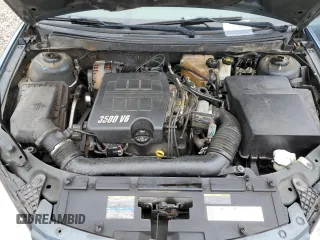 2006 Pontiac G6 6-Cyl z VIN 1G2ZG558064174395, wystawiony jako Copart lot #55348985 z przebiegiem 201 150 mil mil oraz Szkoda całkowita • Salvage title. Historia ofert i sprzedaży dostępna na DreamBid. Obrazek 11.