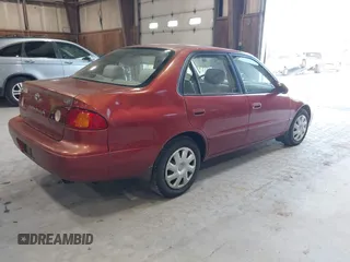 2002 Toyota Corolla CE with VIN 2T1BR12E32C544997, listed as a IAAI auction lot 42621712 with 113,660 mi miles and . Bid and sale history available at DreamBid. Image 4.