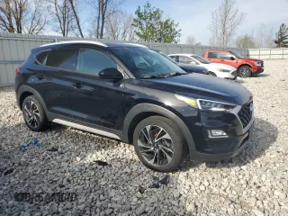 2020 Hyundai Tucson SEL z VIN KM8J33AL9LU148601, wystawiony jako Copart lot #54865805 z przebiegiem 108 868 mil mil oraz Czysty tytuł • Clean title. Historia ofert i sprzedaży dostępna na DreamBid. Obrazek 4.