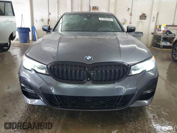 2019 BMW 3 Series 330i xDrive with VIN WBA5R7C57KAJ86027, listed as a Copart auction lot 61203435 with 41,486 mi miles and Salvage title. Bid and sale history available at DreamBid. Image 5.