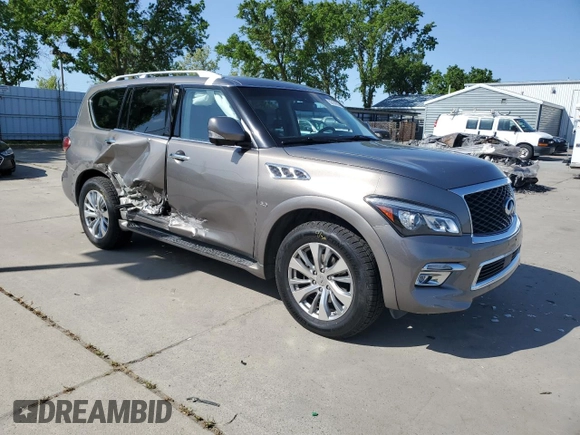2016 Infiniti QX80 with VIN JN8AZ2NEXG9125687, listed as a Copart auction lot 52184535 with 149,495 mi miles and Salvage title. Bid and sale history available at DreamBid. Image 4.