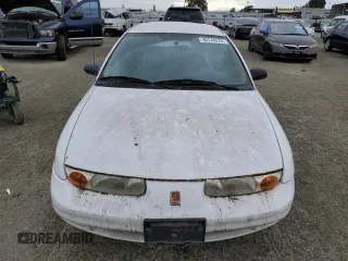 2001 Saturn SL with VIN 1G8ZF52891Z237485, listed as a Copart auction lot 76174574 with 130,525 mi miles and Salvage title. Bid and sale history available at DreamBid. Image 5.