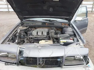 1992 Chrysler New Yorker z VIN 1C3XV66L3ND861794, wystawiony jako IAAI lot #41844564 z przebiegiem 68 016 mil mil oraz . Historia ofert i sprzedaży dostępna na DreamBid. Obrazek 10.