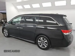 2015 Honda Odyssey Touring Elite with VIN 5FNRL5H95FB017434, listed as a Copart auction lot 55011035 with 111,254 mi miles and Clean title. Bid and sale history available at DreamBid. Image 2.
