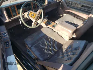 1988 Cadillac Eldorado with VIN 1G6EL1153JU632470, listed as a Copart auction lot 78507684 with 176,894 mi miles and Salvage Title. Bid and sale history available at DreamBid. Image 8.
