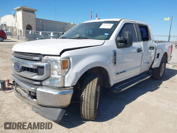 2021 Ford Super Duty F-250 SRW XL with VIN 1FT7W2BT2MEC37128, listed as a IAAI auction lot 41735304 with 103,992 mi miles. Bid and sale history available at carsss.com. Image 18.