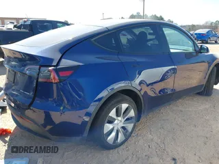 2023 Tesla Model Y Long Range with VIN 7SAYGDEE6PF847890, listed as a IAAI auction lot 41635687 with 32,846 mi miles and . Bid and sale history available at DreamBid. Image 4.