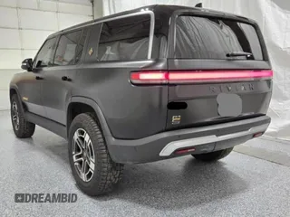 2023 Rivian R1S Launch Edition with VIN 7PDSGABL2PN020404, listed as a Copart auction lot 81428984 with 128 mi miles and Clean Title. Bid and sale history available at carsss.com. Image 3.