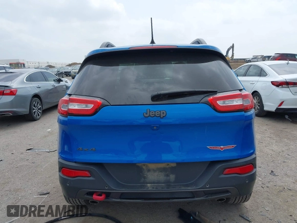 2018 Jeep Cherokee Trailhawk with VIN 1C4PJMBX6JD569684, listed as a IAAI auction lot 41925325 with 149,446 mi miles and . Bid and sale history available at DreamBid. Image 17.