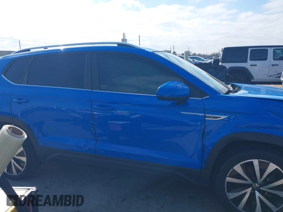 2022 Volkswagen Taos SE z VIN 3VVRX7B28NM088778, wystawiony jako IAAI lot #41624907 z przebiegiem 32 903 mil mil oraz . Historia ofert i sprzedaży dostępna na DreamBid. Obrazek 13.