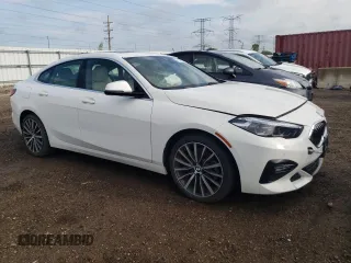 2021 BMW 2 Series 228i xDrive with VIN WBA73AK05M7H11134, listed as a Copart auction lot 61682735 with 21,901 mi miles and Salvage title. Bid and sale history available at DreamBid. Image 4.