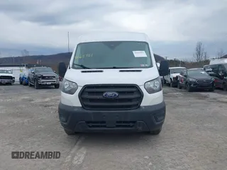 2020 Ford Transit Cargo z VIN 1FTBR2C86LKB45614, wystawiony jako IAAI lot #41665561 z przebiegiem 50 727 mil mil oraz . Historia ofert i sprzedaży dostępna na DreamBid. Obrazek 12.