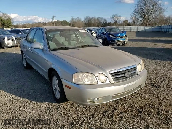 2005 Kia Optima LX z VIN KNAGD128155423463, wystawiony jako Copart lot #87441284 z przebiegiem 143 193 mil mil oraz Szkoda całkowita • Salvage title. Historia ofert i sprzedaży dostępna na DreamBid. Obrazek 11.