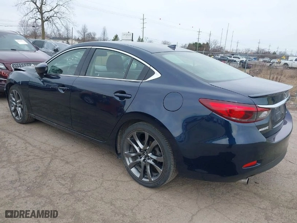 2016 Mazda Mazda6 i Grand Touring with VIN JM1GJ1W57G1486962, listed as a IAAI auction lot 41813471 with 64,078 mi miles. Bid and sale history available at carsss.com. Image 3.