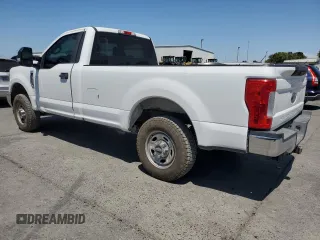 2019 Ford F-250 XL with VIN 1FTBF2A61KED12145, listed as a Copart auction lot 63007095 with 107,594 mi miles and Salvage title. Bid and sale history available at DreamBid. Image 2.