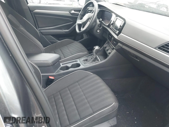 2023 Volkswagen Jetta Sport with VIN 3VWBM7BU8PM005151, listed as a IAAI auction lot 41886412 with 23,351 mi miles and . Bid and sale history available at DreamBid. Image 5.