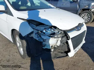 2014 Ford Focus SE with VIN 1FADP3F27EL215930, listed as a IAAI auction lot 41282263 with 130,324 mi miles. Bid and sale history available at carsss.com. Image 6.