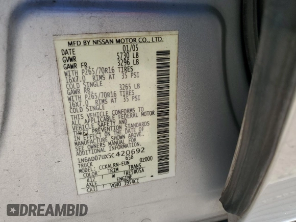 2005 Nissan Frontier LE with VIN 1N6AD07UX5C420692, listed as a Copart auction lot 49714825 with 239,822 mi miles and Salvage title. Bid and sale history available at DreamBid. Image 12.