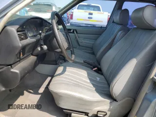 1986 Mercedes-Benz 190 with VIN WDBDA24D4GF155793, listed as a Copart auction lot 68599054 with 193,233 mi miles and Clean Title. Bid and sale history available at carsss.com. Image 7.