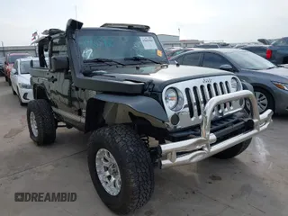 2016 Jeep Wrangler Sport z VIN 1C4AJWAG0GL323778, wystawiony jako IAAI lot #41865960 z przebiegiem 80 485 mil mil oraz . Historia ofert i sprzedaży dostępna na DreamBid. Obrazek 1.
