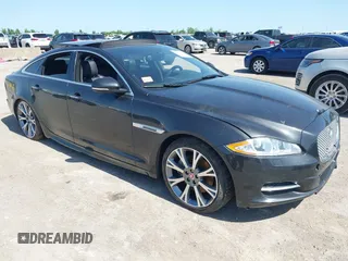 2015 Jaguar XJ R-Sport with VIN SAJWJ1CD6F8V83990, listed as a IAAI auction lot 41936162 with Not Provided miles and . Bid and sale history available at DreamBid. Image 1.