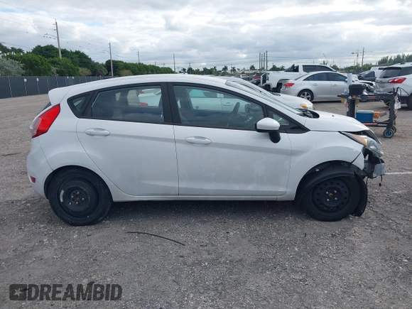 2019 Ford Fiesta SE z VIN 3FADP4EJ5KM132862, wystawiony jako IAAI lot #40893430 z przebiegiem 91 011 mil mil oraz . Historia ofert i sprzedaży dostępna na DreamBid. Obrazek 13.
