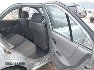 2003 Hyundai Accent GL with VIN KMHCG45C43U465523, listed as a IAAI auction lot 40883056 with 95,770 mi miles. Bid and sale history available at carsss.com. Image 8.