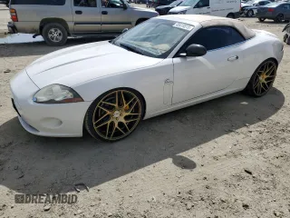 2007 Jaguar XK with VIN SAJDA44B775B05606, listed as a Copart auction lot 49419515 with 115,607 mi miles and Salvage Title. Bid and sale history available at DreamBid. Image 1.