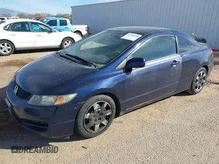 2009 Honda Civic Cpe LX with VIN 2HGFG12679H508263, listed as a IAAI auction lot 41498344 with 128,876 mi miles. Bid and sale history available at carsss.com. Image 2.