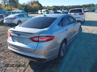 2016 Ford Fusion Titanium with VIN 3FA6P0K9XGR100723, listed as a IAAI auction lot 40627172 with 1 mi miles. Bid and sale history available at carsss.com. Image 4.