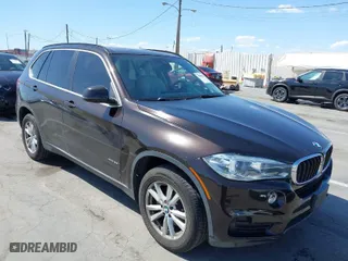 2015 BMW X5 xDrive35i with VIN 5UXKR0C57F0K54298, listed as a IAAI auction lot 41969125 with 95,853 mi miles. Bid and sale history available at carsss.com. Image 1.
