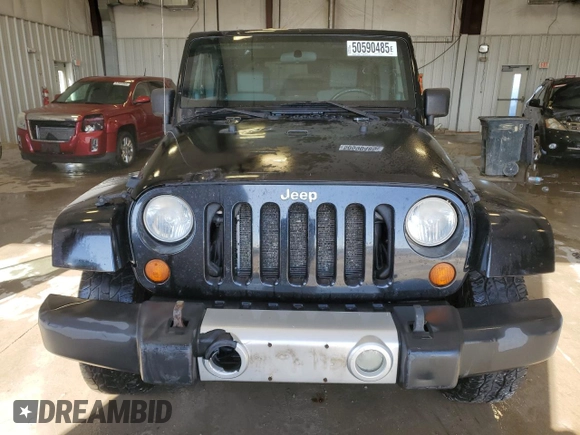 2008 Jeep Wrangler Unlimited Sahara with VIN 1J4GA59198L623643, listed as a Copart auction lot 50590485 with 198,000 mi miles and Non Repairable. Bid and sale history available at carsss.com. Image 5.