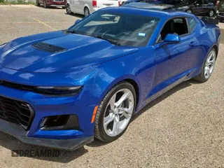 2021 Chevrolet Camaro LT1 с VIN 1G1FF1R77M0104174, выставлен на аукционе Copart как лот 60335235 с пробегом 38 595 миль миль и Списание • Salvage title. История ставок и продаж доступна на DreamBid. Изображение 2.